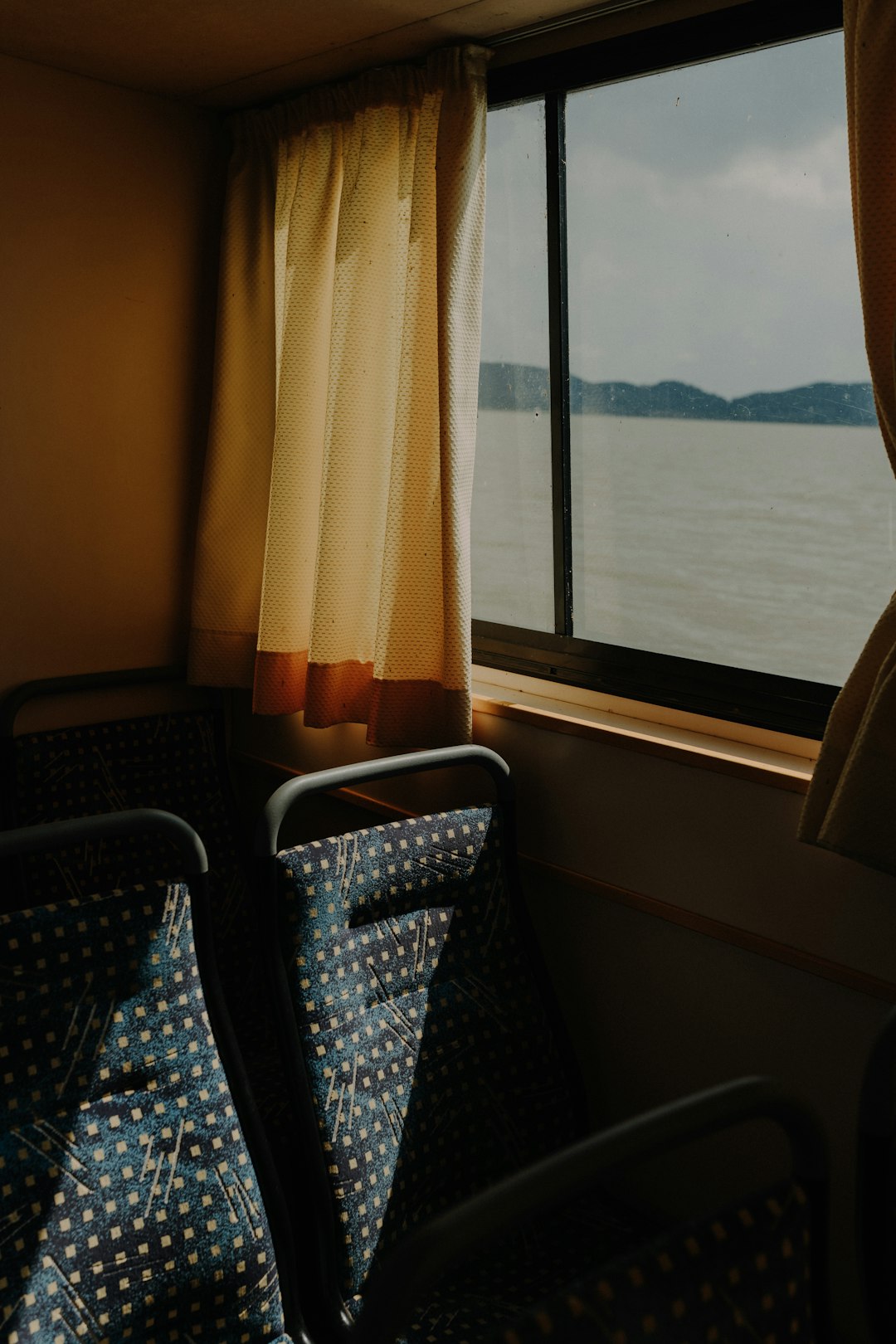 Sunset Boat Through Window Wallpaper