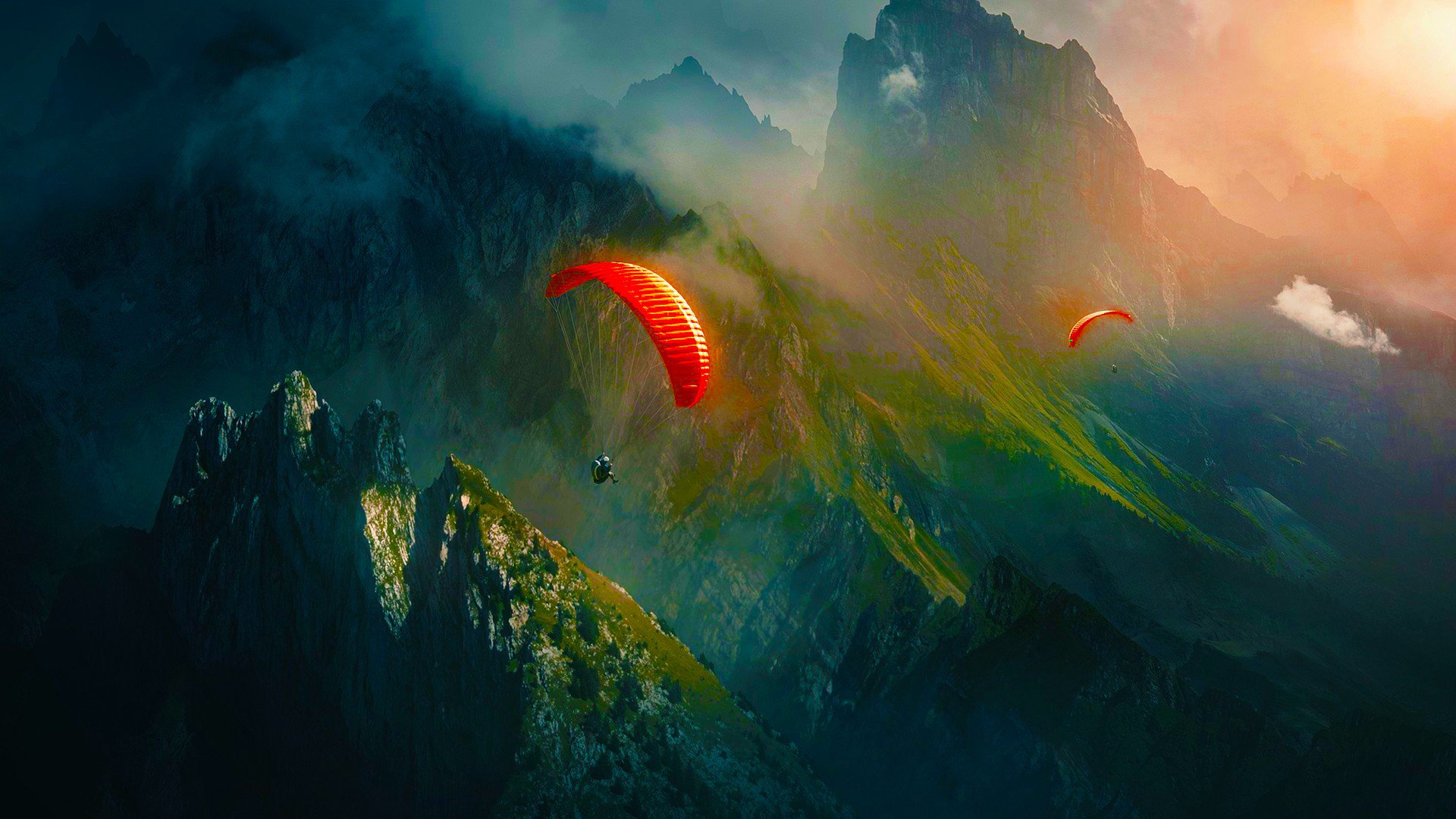 Paragliding Over Rocky Peaks Wallpaper