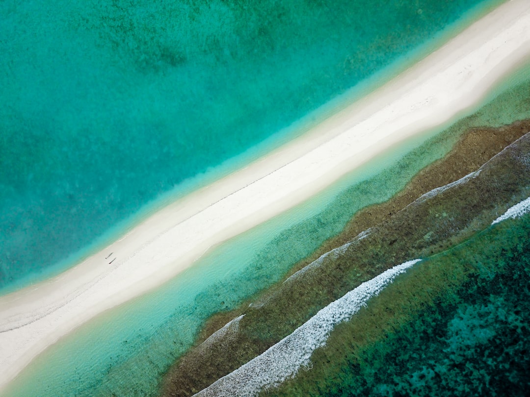 Aerial Blue Lagoon Shoreline Wallpaper