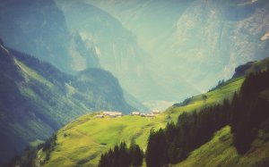 Collector's Choice - Misty Swiss Mountains Wallpaper
