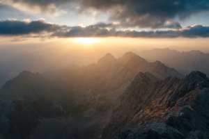 Collector's Choice - Alpine Sunrise Peaks Wallpaper